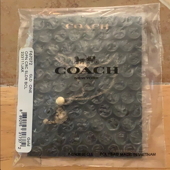 Coach Open Circle Gold Slider Bracelet. - Picture 5 of 5